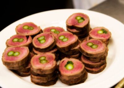 Asparagus stuffed sliced steak.