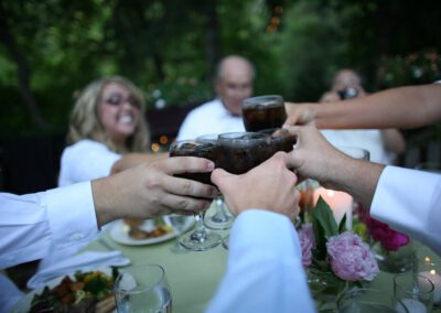 Wedding table tapping glasses for cheers