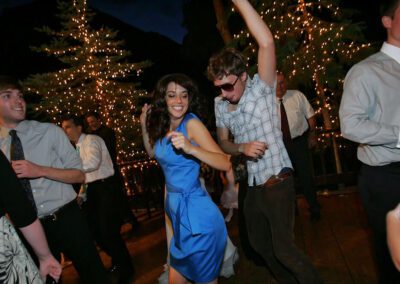 Two young people dancing at a party